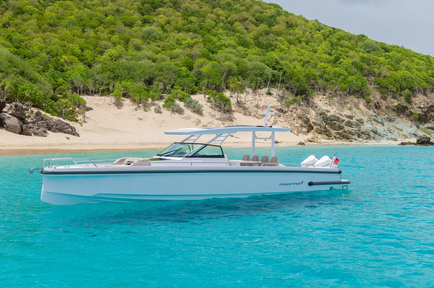 Axopar Sun Top 37 side profile at anchor in turquoise water