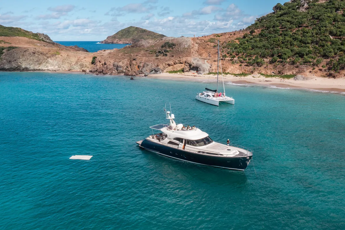 Mochi 74 anchored off a wild St Barth beach