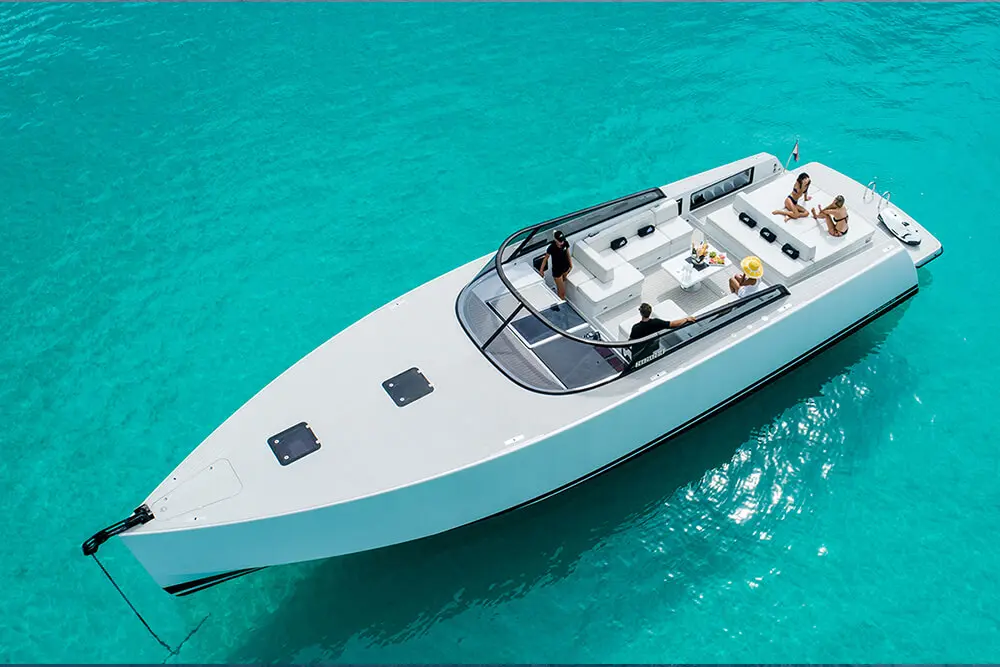 VanDutch 55 motor yacht at anchor in turquoise water